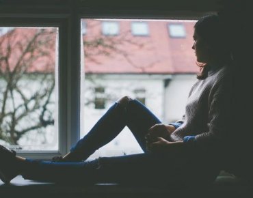 Woman sitting alone